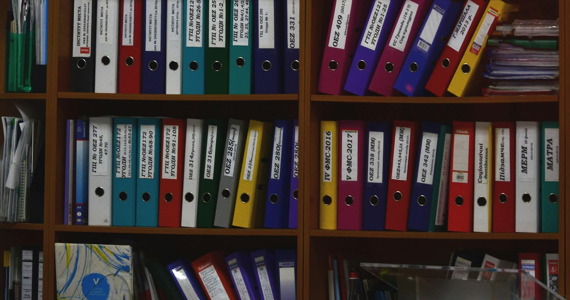 Organised desk workspace with files and folders representing a well-structured Claude project setup