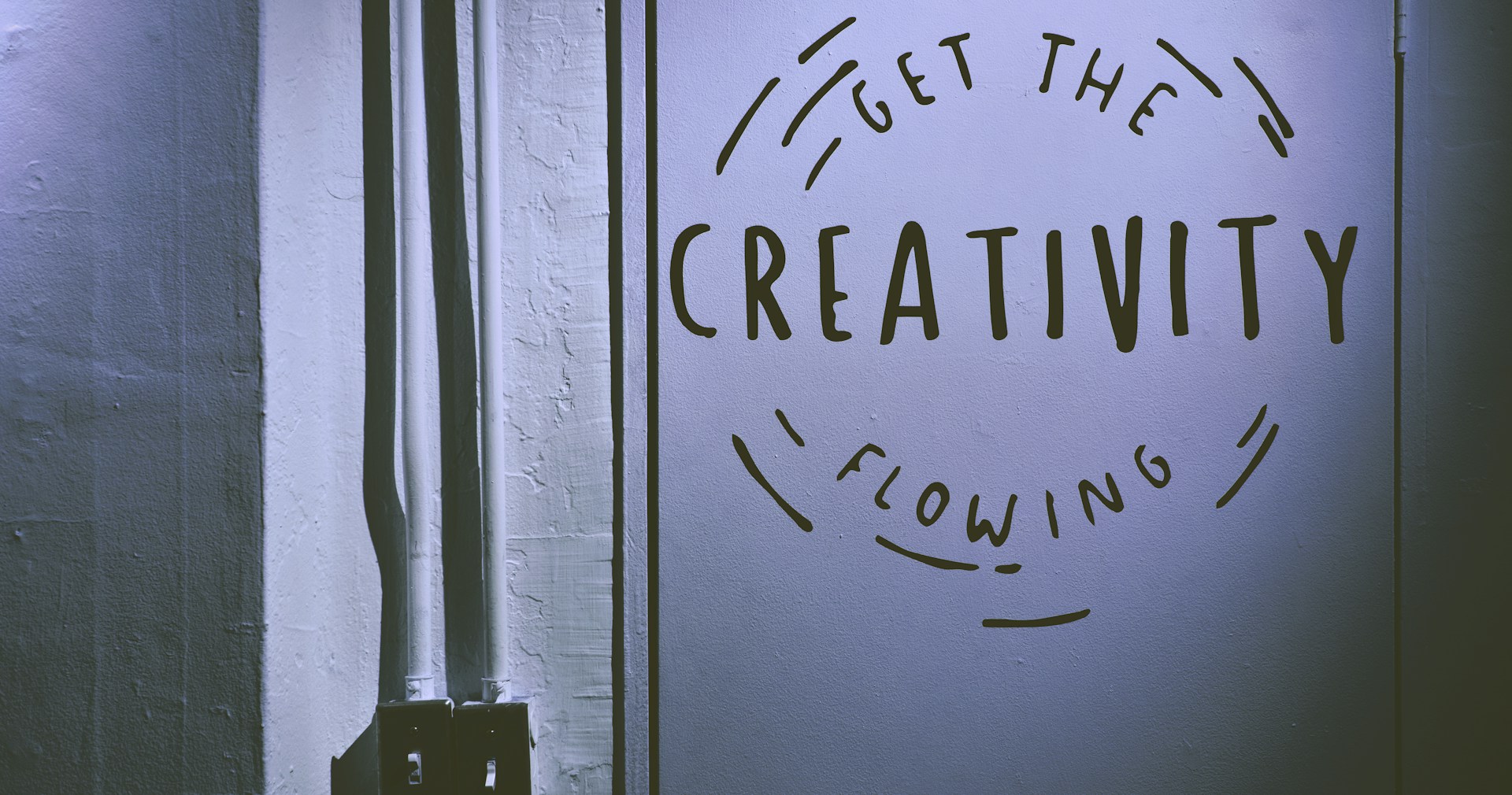Creative professional in a productive flow state using Claude AI workflows for design and content work